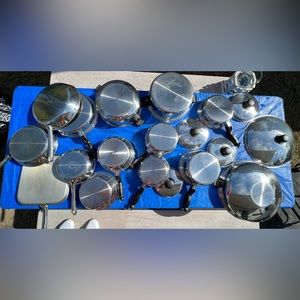 Cutco pots and pans set along with other pans that were purchased separately.